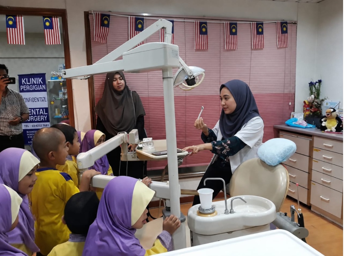 Dr. Verima Saria caring for young patients at CONFIDENTAL, Ampang